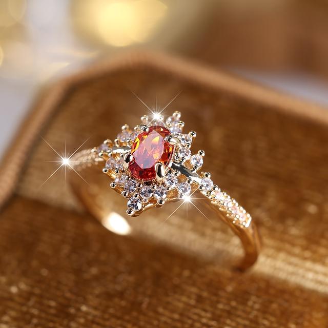 TEMU Ein stilvoller Ring mit einem roten, eiförmigen, funkelnden künstlichen Zirkonia, für Damen-Hochzeitsschmuck oder als Geschenk für eine Verabredung.