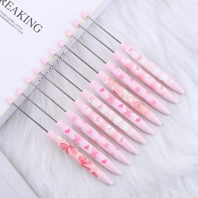 TEMU 귀여운 리본과 하트 디자인의 핑크 프린트 연장 비즈 펜 10개 세트. 다양한 비즈를 끼울 수 있습니다.