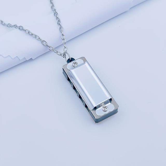 TEMU A Mini Harmonica With 4 Holes And , Of Playing And Songs. In Multiple Colors, A Great Beginner Instrument And Makes An Small Gift For Christmas And New Year Celebrations
