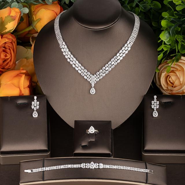 TEMU An Elegant Cubic Synthetic Zirconia Teardrop-set Necklace, Bracelet, Earrings, And Ring Set, Suitable For Women's Wedding Wear