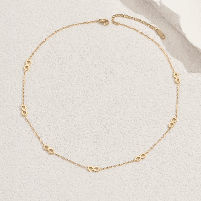 TEMU قلادة أنيقة مطلية بالذهب عيار 18 قيراط من الفولاذ المقاوم للصدأ | متينة ومقاومة للبهتان، تصميم رمز اللا محدود، مثالية للارتداء اليومي أو المناسبات الخاصة، إكسسوار للحفلات والمهرجانات