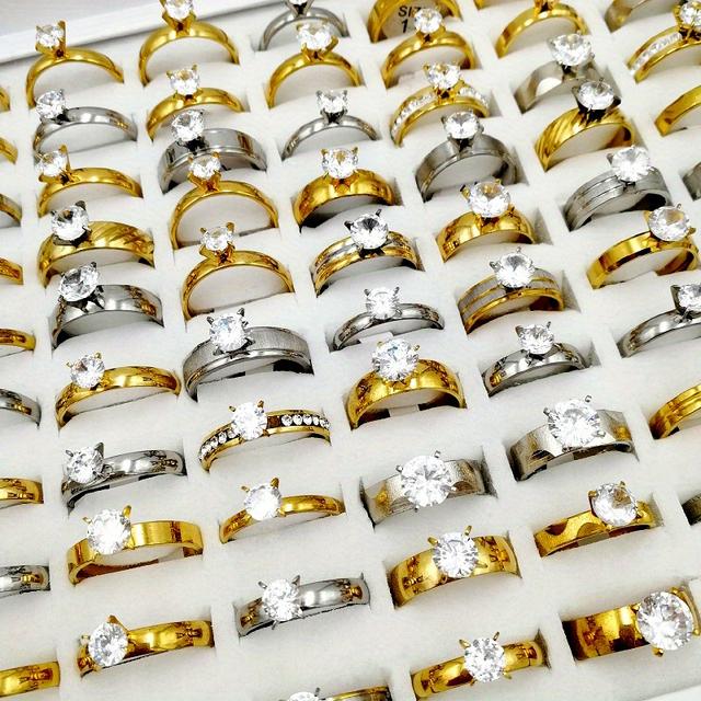 TEMU ขายส่ง 12 ชิ้น/แพ็ค แหวนสแต็กแฟชั่นสตรี สแตนเลสสตีล ขนาดตั้งแต่ 17mm ถึง 21mm สำหรับผู้ชายและผู้หญิง แบบมิกซ์เดรส ใช้ได้ในงานปาร์ตี้ งานสังสรรค์ ชุดแหวนน่ารัก ไม่มีกล่องบรรจุ