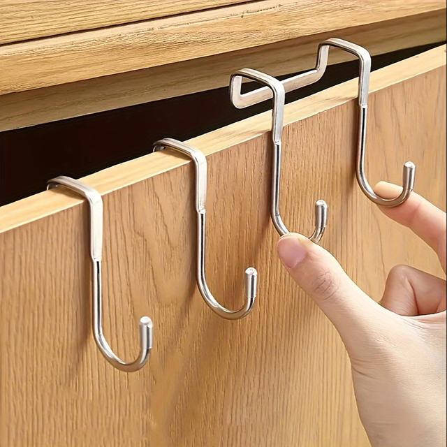 TEMU A Stainless Steel Hook - Wall-mounted Without Drilling, Suitable For Kitchens, Bathrooms, And Cabinet Doors. This Used To Hang Clothes, Towels, And Utensils.