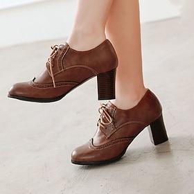vintage bruine oxford dameshakken - perfect voor kantoor- en formele evenementen, met brogue-details en comfortabele middenhak