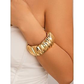 dikke gouden armband voor dames met een getextureerde afwerking - een opvallend statement piece, perfect voor bohemian mode