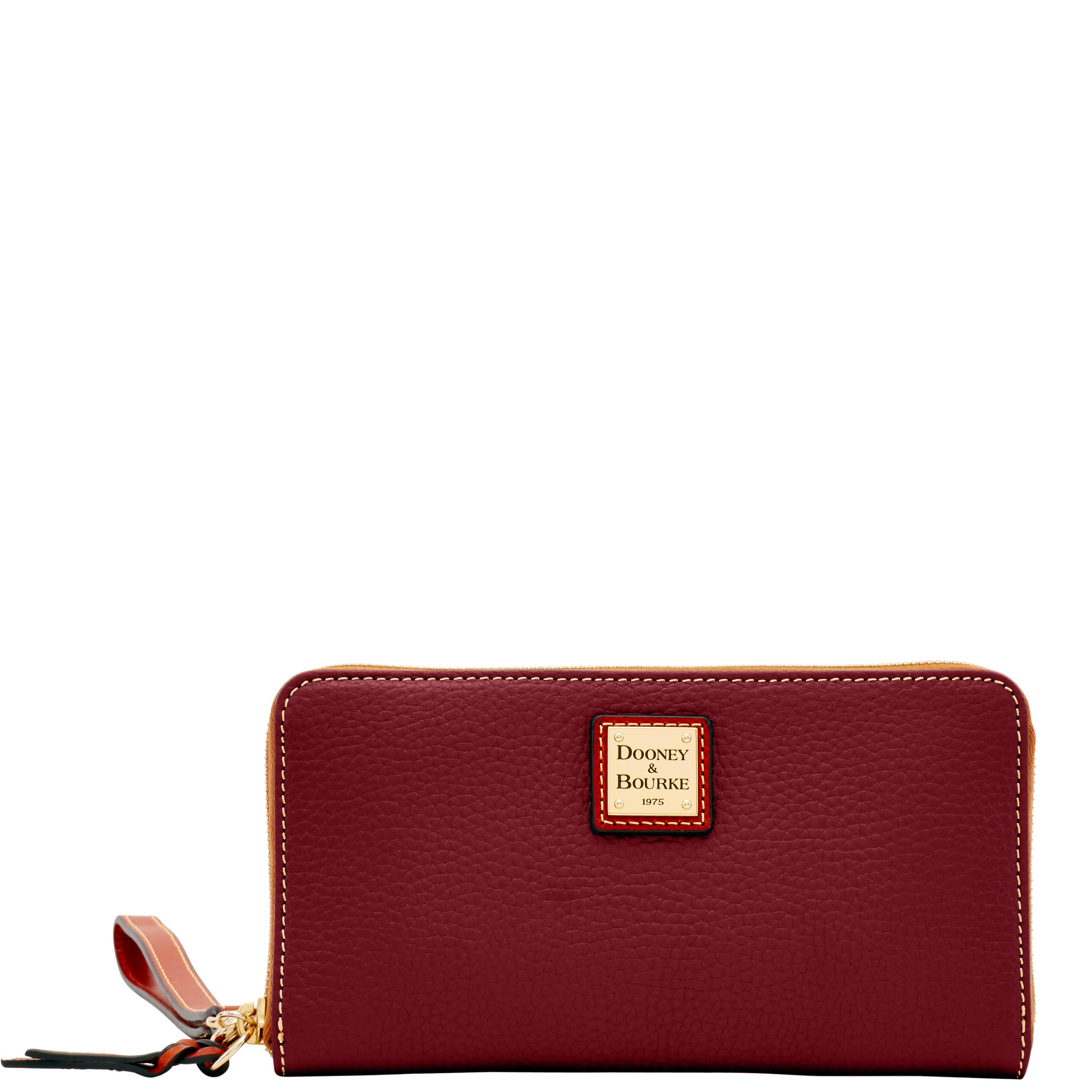 Dooney & Bourke Women's Pebble Grain Large Zip Around Leather Wristlet in Bordeaux