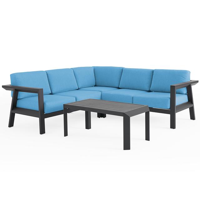 St. Lucia Midnight Aluminum with Cushions 4 Piece Sectional Group + 43 x 22 in. Coffee Table (Canvas Sky Blue)