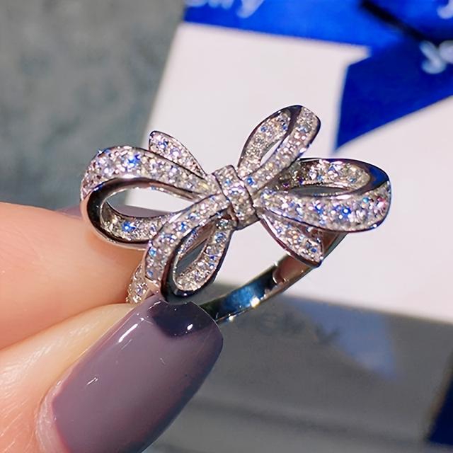 TEMU A Stylish And 's Ring With An Elegant And Bow Inlaid With Synthetic Zirconia, Suitable For Daily Casual Parties And Banquets, A Birthday Gift For Women (without Box).