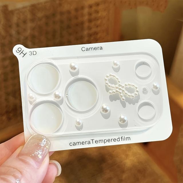 TEMU 【iPhone 17 Pro Max/17 Pro対応】3Dリボン型ビーズ クリアカメラフィルムター 1個。透明レンズカバーアクセサリー付きで可愛らしい。