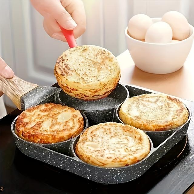 TEMU Single Unit Of A Four-hole Frying Pan Designed For Cooking Eggs, Featuring A Surface, Suitable For Making Pancakes, And Equipped With A Wooden Handle