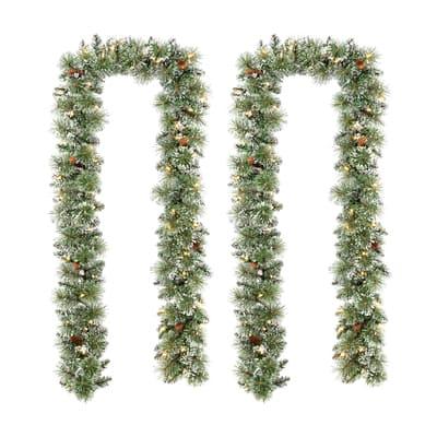 Glitzhome® 9Ft Pre-Lit Frosted Greenery Pinecones Christmas Garlands with Timers, 2ct. | 9 ft | Michaels®