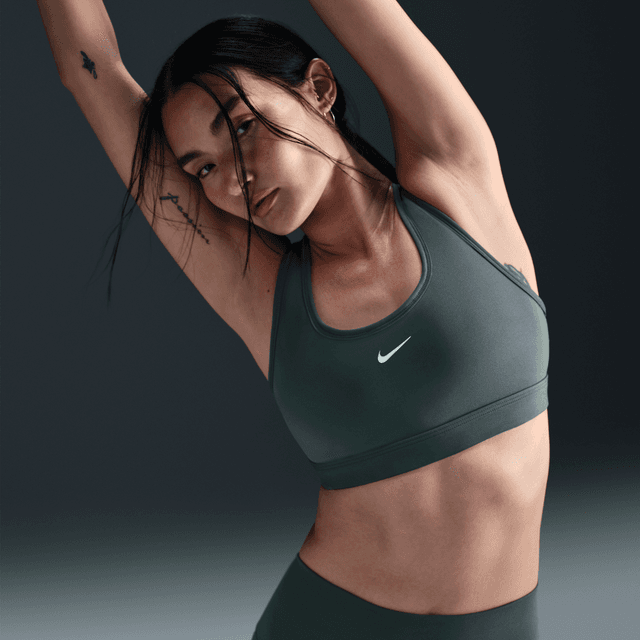 Nike Women's Swoosh Light Support Non-Padded Sports Bra in Green | DX6817-338